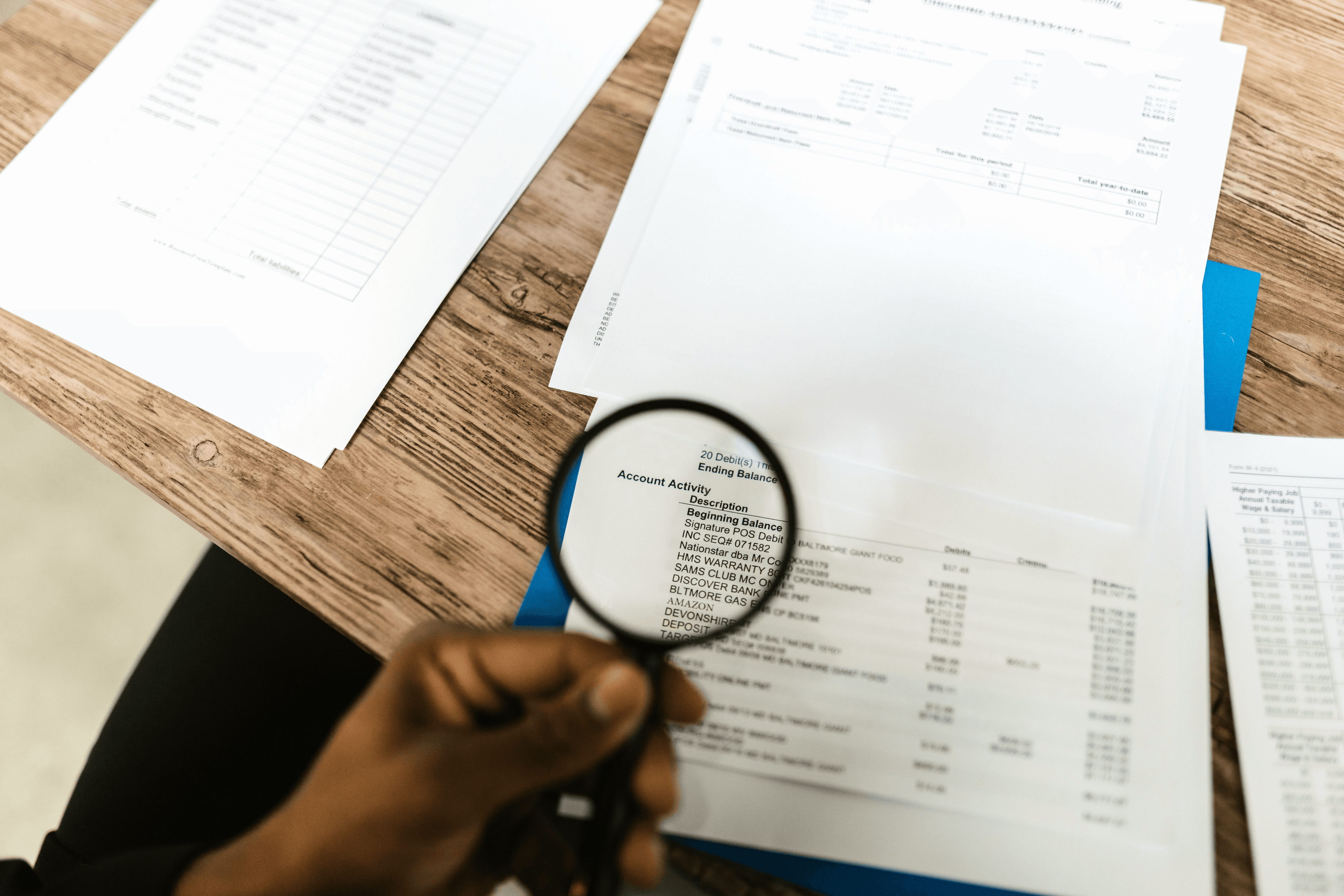 An Australian importer reviewing supplier documents to spot a China sourcing scam